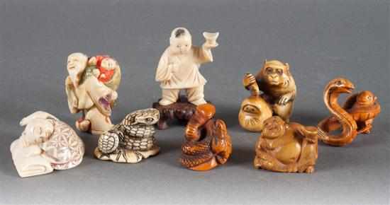 Appraisal: Eight assorted carved and polychromed ivory netsukes and figures th