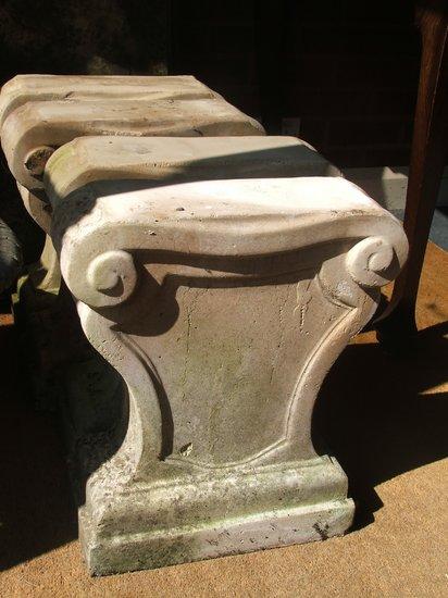 Appraisal: A PAIR OF WEATHERED COMPOSITION GARDEN BENCHES each with Tuscan