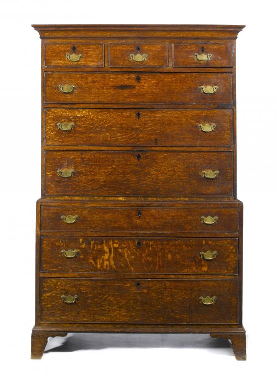 Appraisal: A GEORGE III OAK CHEST-ON-CHEST the upper part with cavetto