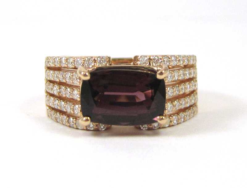 Appraisal: PURPLE TOURMALINE AND DIAMOND RING The k rose gold ring