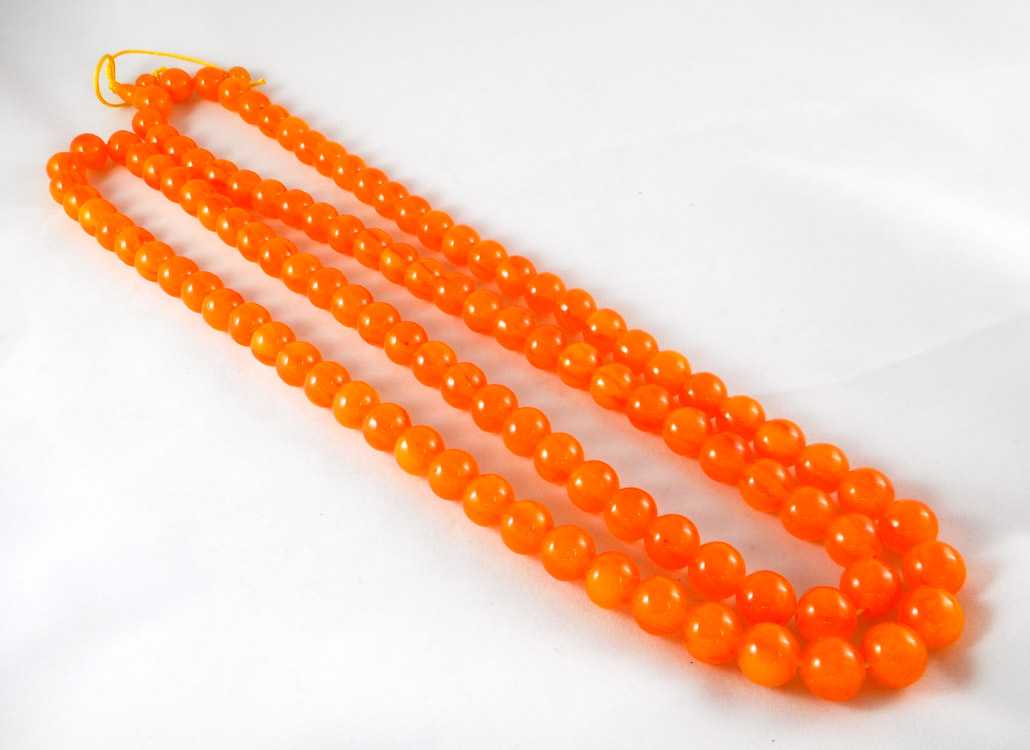 Appraisal: BALTIC PRESSED AMBER PRAYER BEAD NECKLACE with approximately beads Length