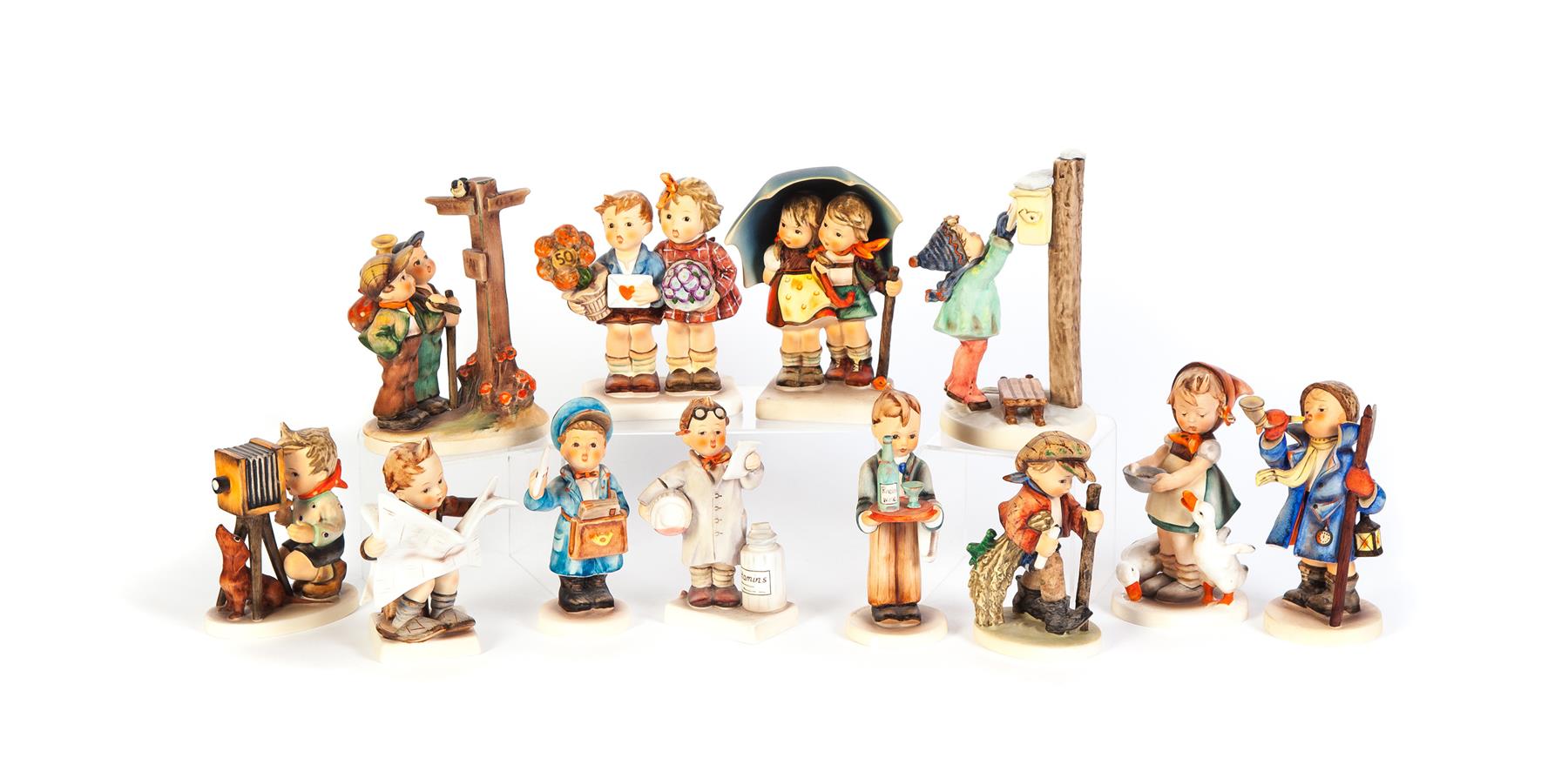 Appraisal: TWELVE HUMMEL FIGURES Germany th century The Love Lives On