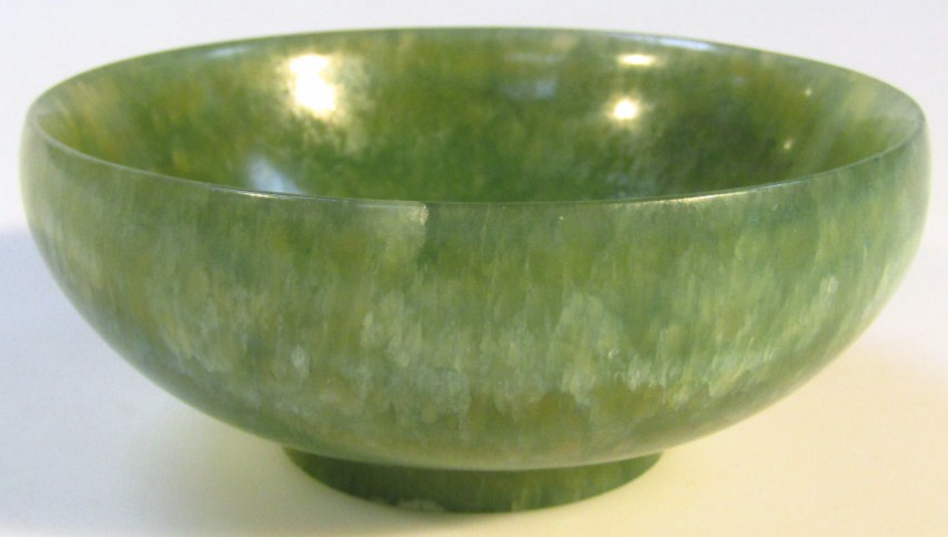 Appraisal: A thC Chinese green jade finish bowl the circular plain