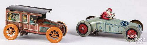 Appraisal: CHEIN LITHOGRAPHED TIN WIND-UP RACE CAR AND LIMOChein lithographed tin