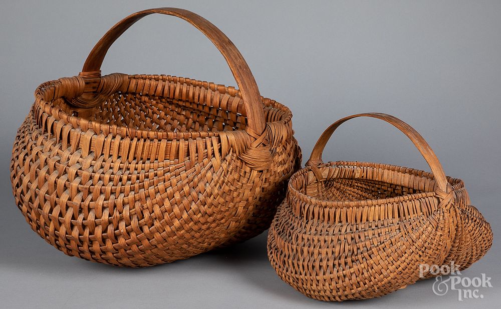 Appraisal: Two woven baskets Two woven baskets h w h w