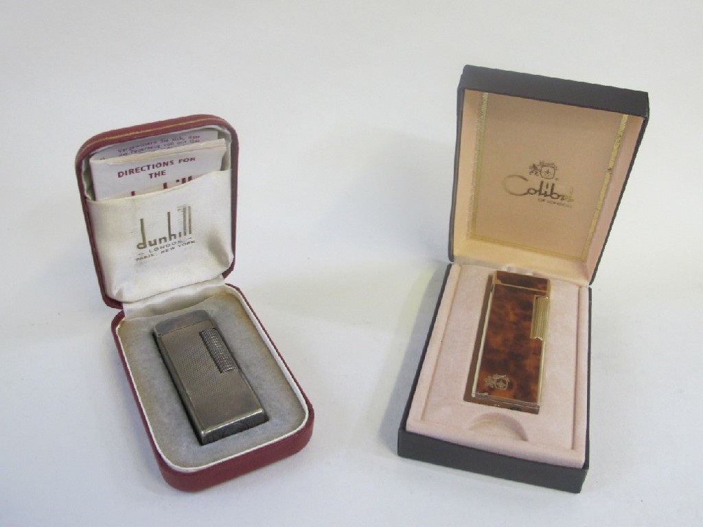 Appraisal: Lot comprising cased Dunhill cigarette lighter and a Calibri lighter