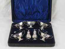 Appraisal: A boxed late Victorian cruet set of four salts two