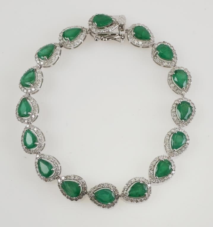 Appraisal: K white gold with pear shaped mixed cut natural emeralds