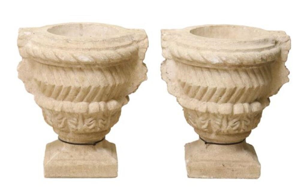 Appraisal: pair Cast stone garden planter urns having ribbon twist rim