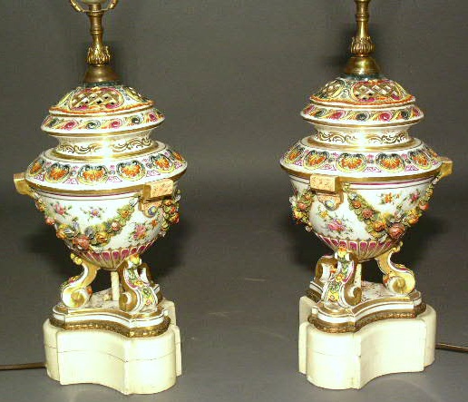 Appraisal: Pair of continental porcelain table lamps c with wood bases