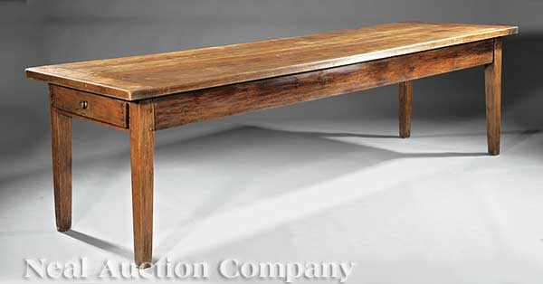 Appraisal: A Large Cherrywood Farmhouse Table composed of antique elements plank