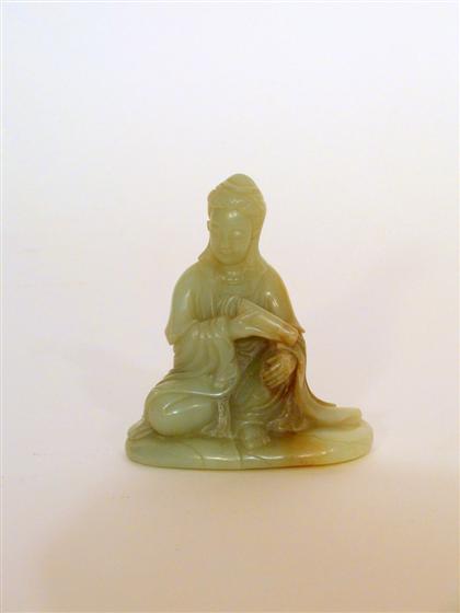 Appraisal: Chinese celadon jade Quanyin th century Of seated form down