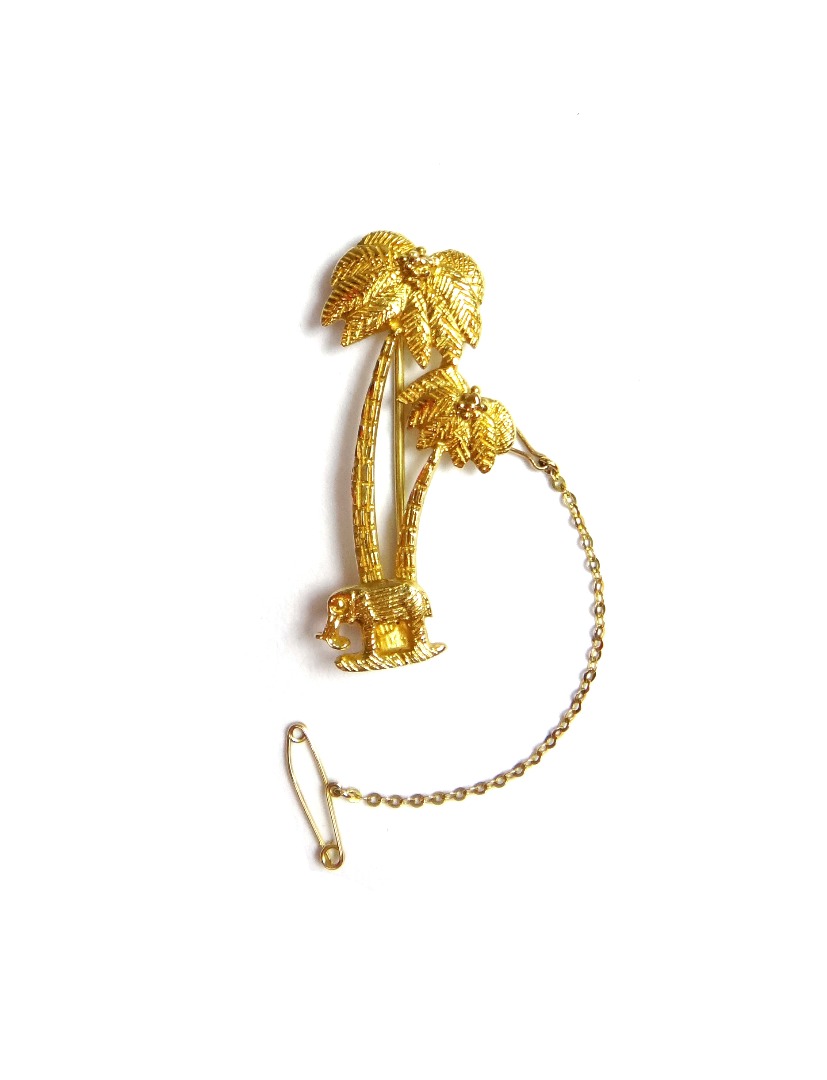 Appraisal: An African gold brooch designed as two palm trees and