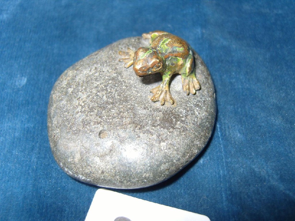 Appraisal: A small bronze figure of a frog with partially painted