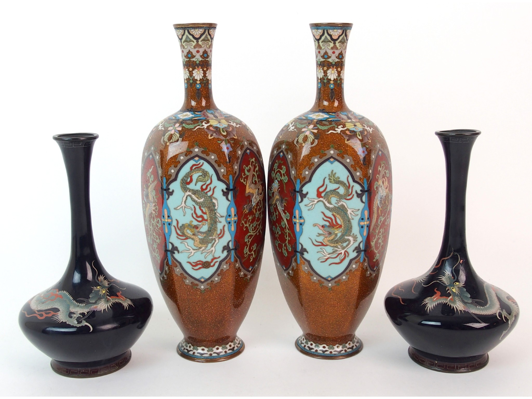 Appraisal: A pair of Japanese hexagonal cloisonne vasesdecorated with dragons ho-o