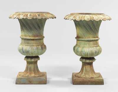 Appraisal: A Pair of Cast Iron Garden Urns Traditional urn shape