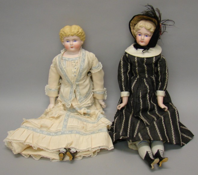 Appraisal: Pair of shoulderhead dolls with molded curly blonde hair and