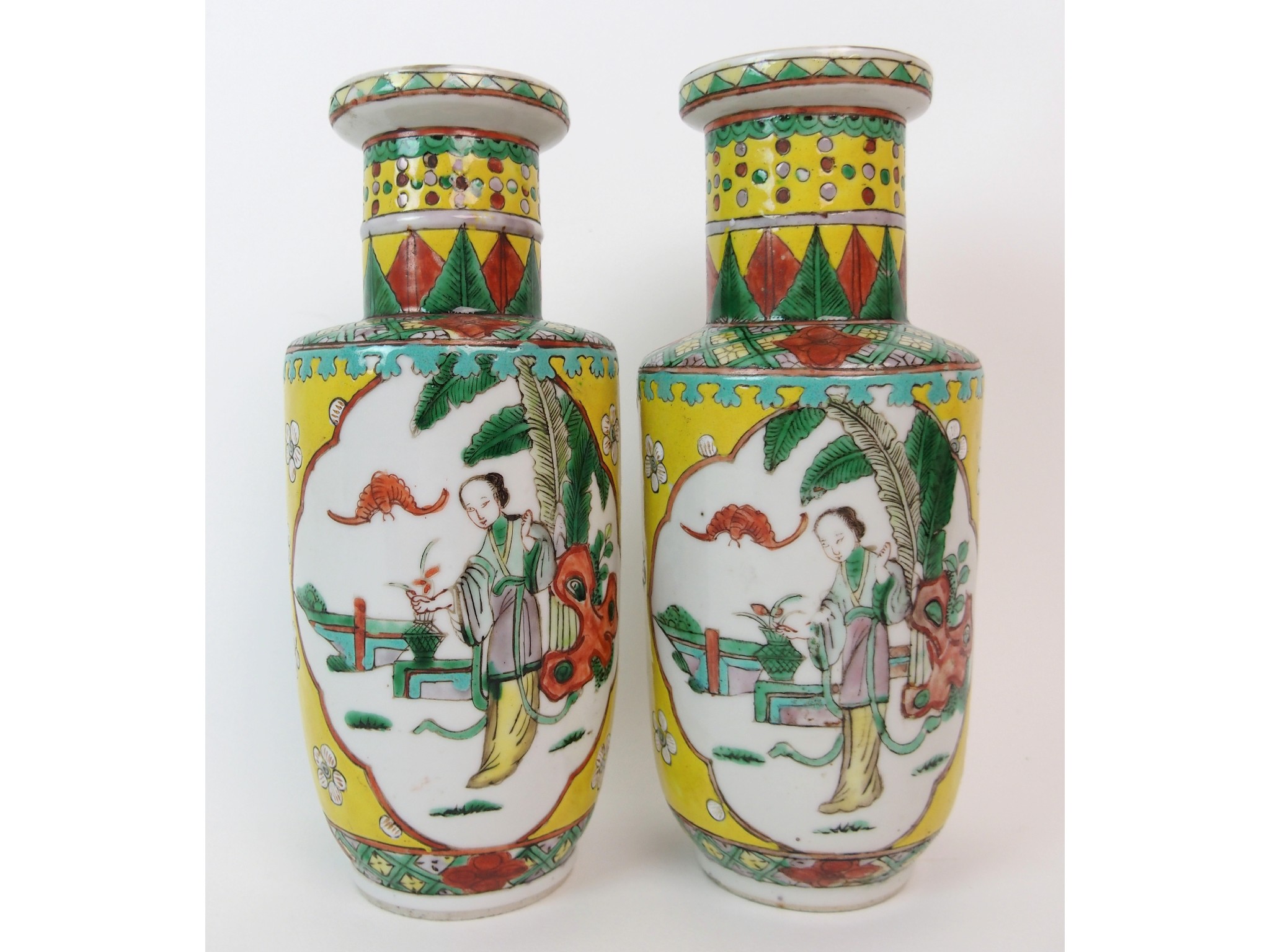 Appraisal: A pair of Chinese famille verte vaseson a yellow ground