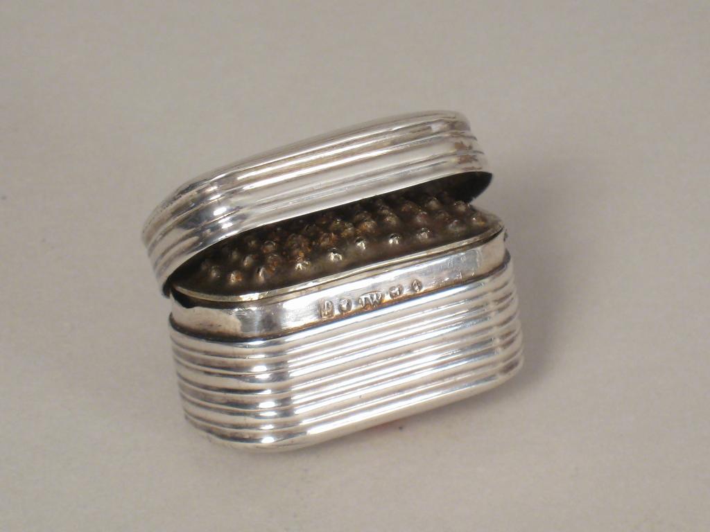 Appraisal: A George III Nutmeg Grater of reeded rectangular form with