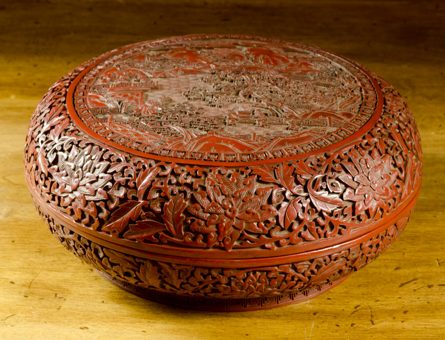 Appraisal: CHINESE ROUND RED CINNABAR LACQUER BOX the dome cover featuring