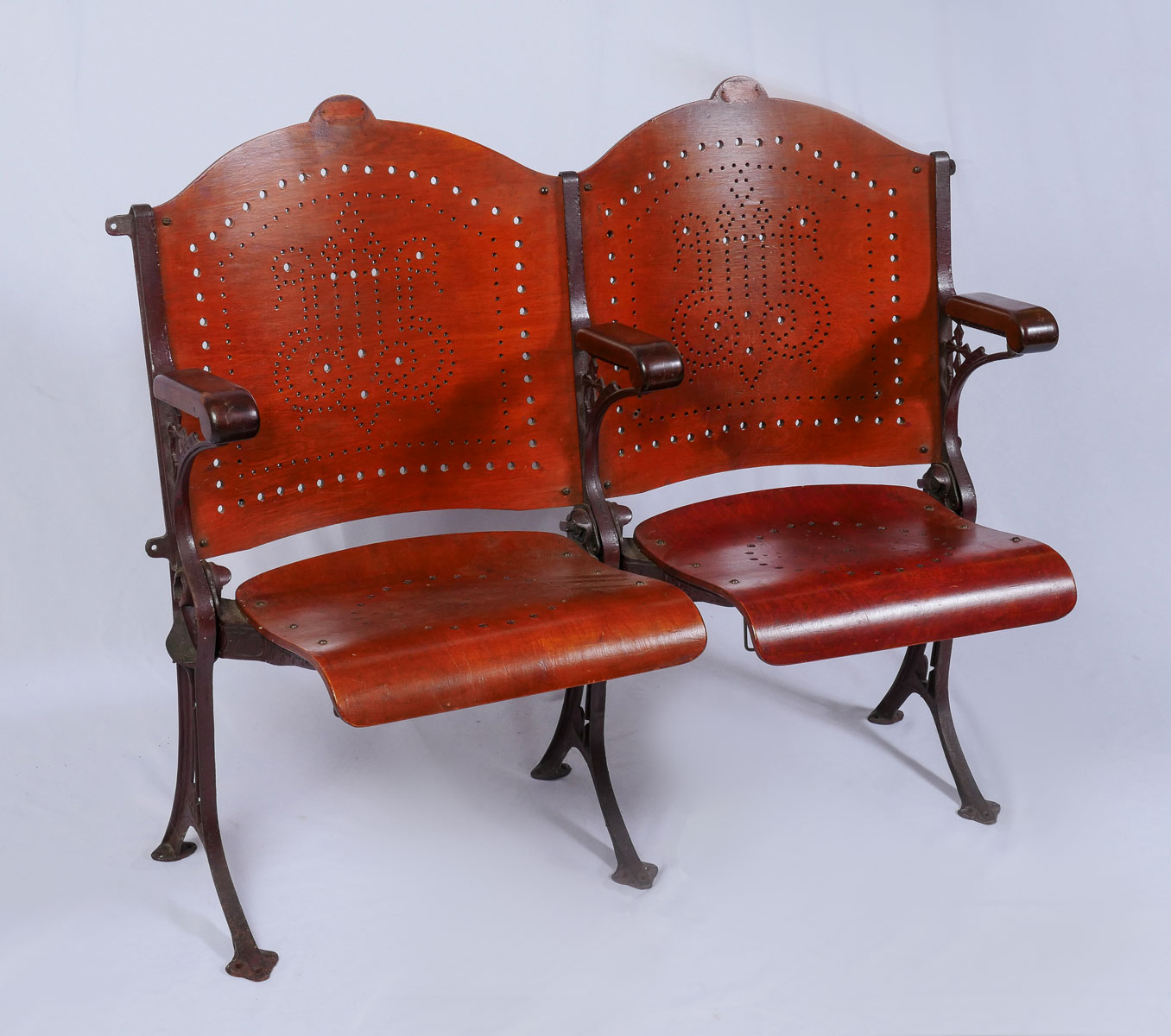 Appraisal: EARLY THEATER SEATS Cast metal frame with folding seats having