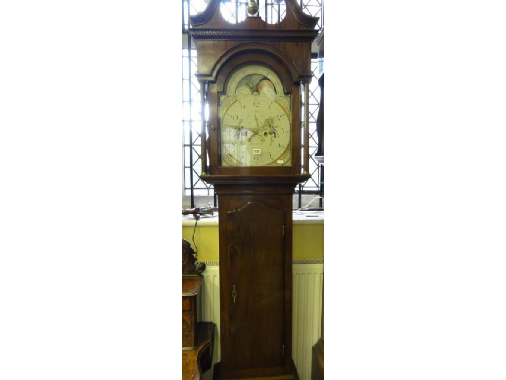 Appraisal: A Georgian mahogany longcase clock the hood with swan neck