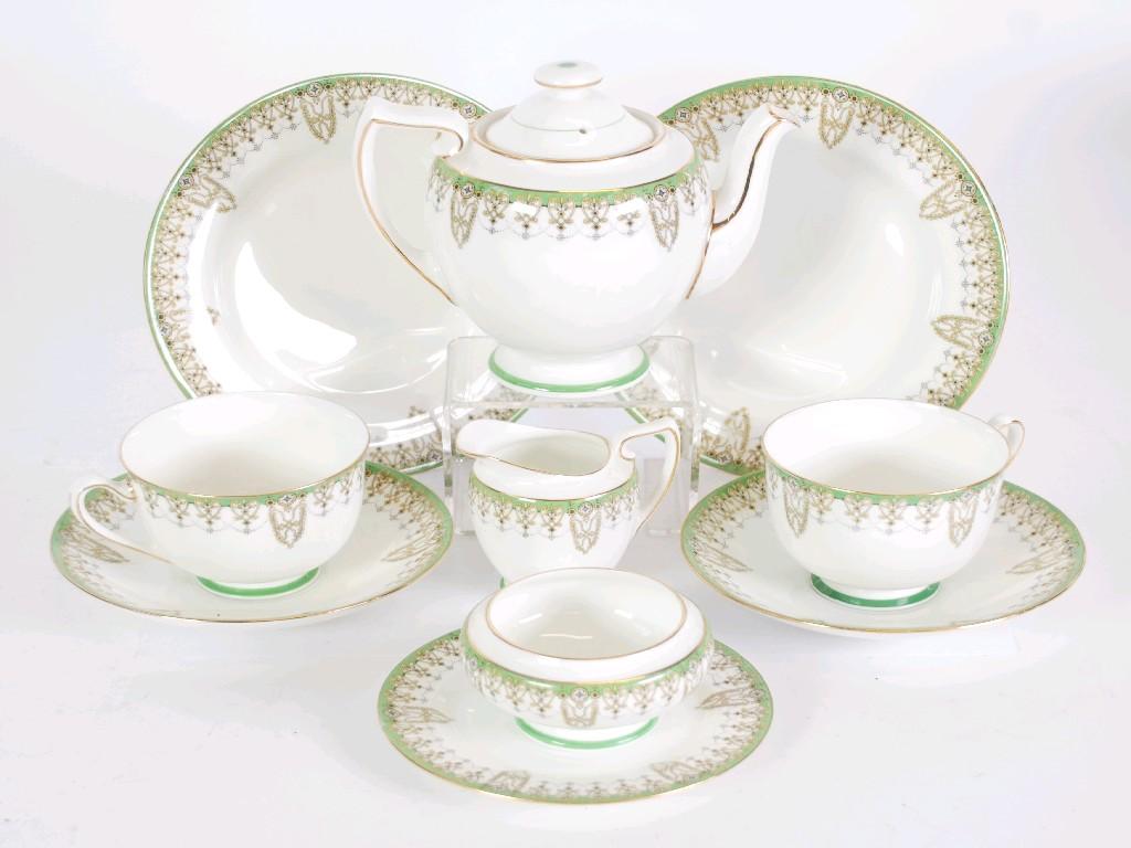 Appraisal: ROYAL DOULTON 'TIVOLI' PATTERN PORCELAIN ELEVEN PIECE TEA SET FOR