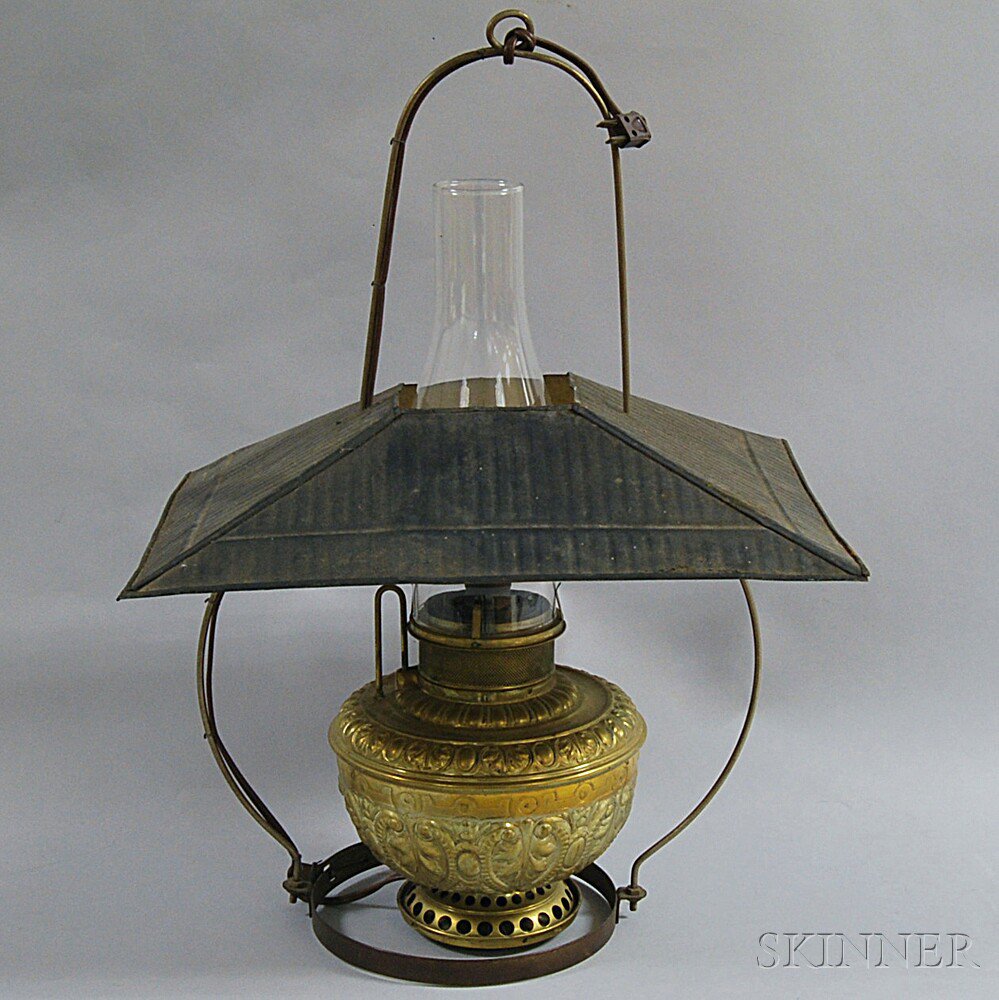 Appraisal: Brass Hanging Lamp late th century the embossed brass lamp