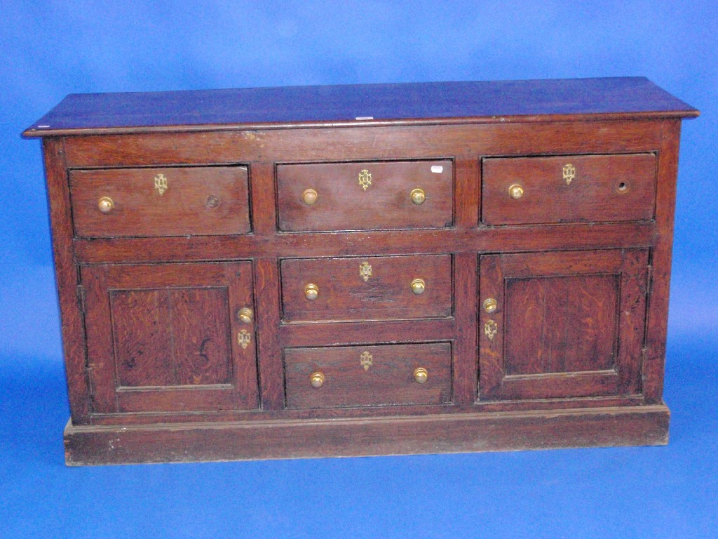 Appraisal: An th century oak dresser base with an arrangement of