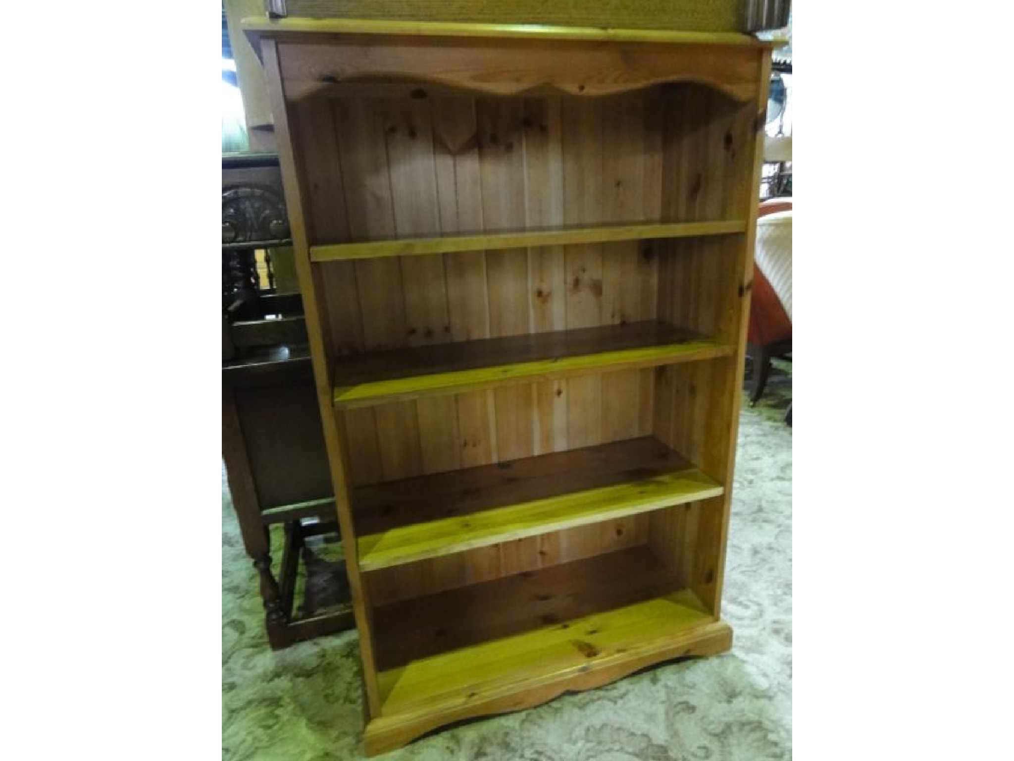 Appraisal: A modern stripped pine freestanding open bookcase with three adjustable