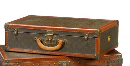 Appraisal: Louis Vuitton hardsided suitcase mid th century Covered in typical