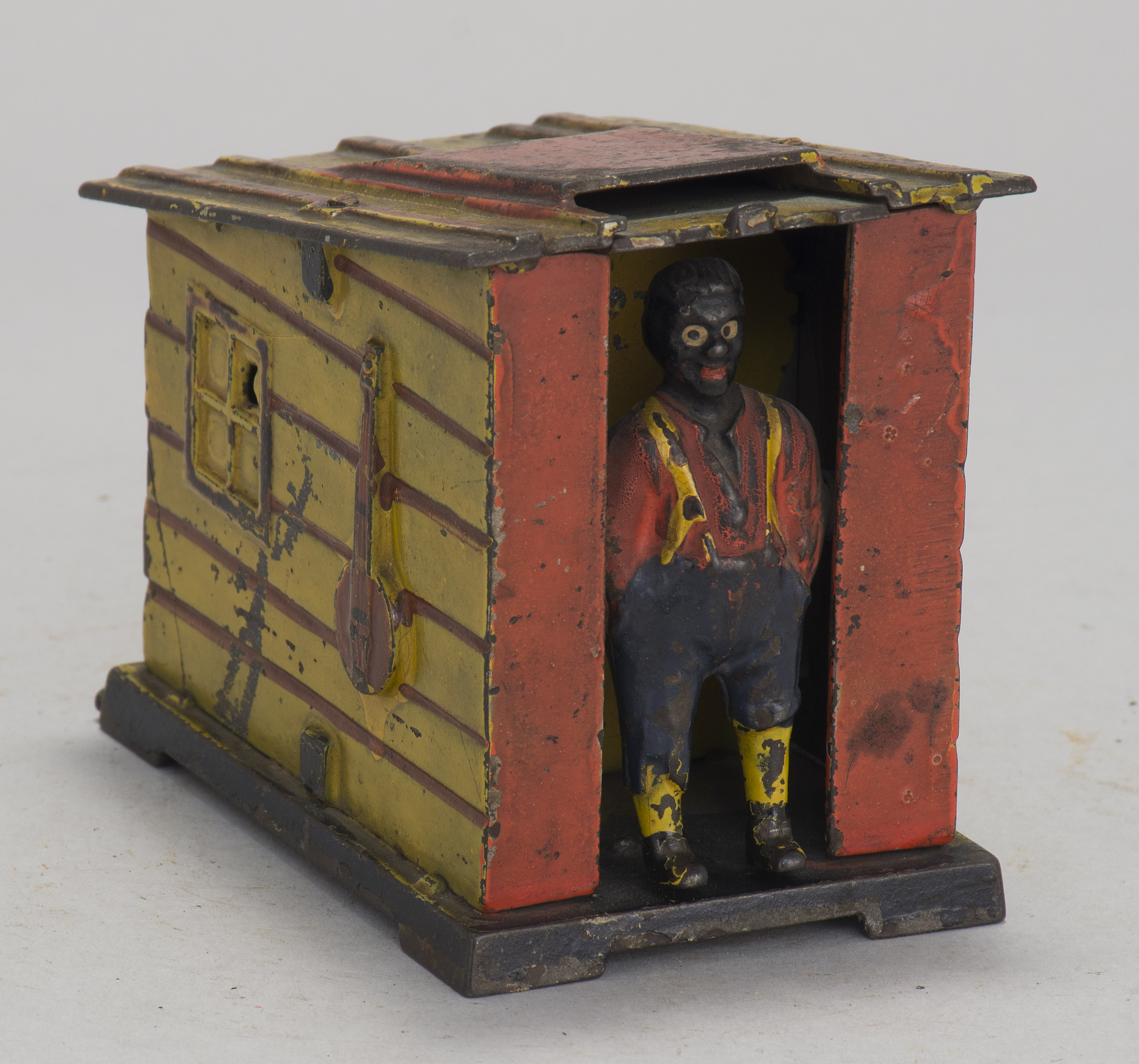 Appraisal: CABIN CAST IRON MECHANICAL BANK Patented By J E Stevens