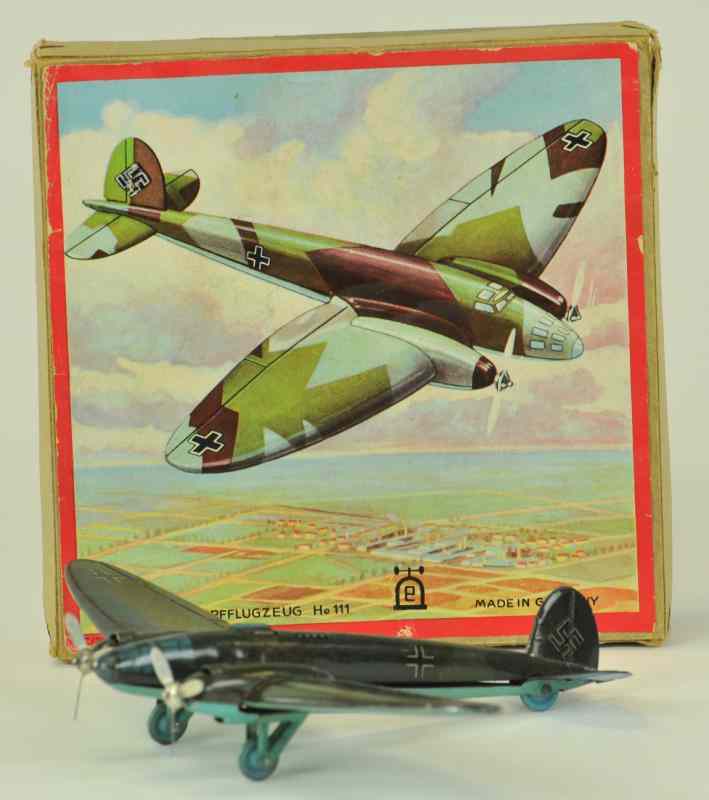 Appraisal: LEHMANN HEINKEL BOMBER WITH BOX Lithographed tin construction plane done