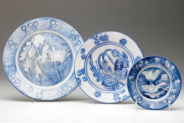 Appraisal: DEDHAM Crackleware three plates in the Poppy pattern Indigo stamps