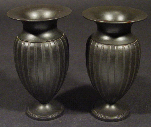 Appraisal: Pair of Wedgwood black basalt baluster vases with fluted decoration