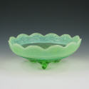 Appraisal: Green opalescent glass three-footed bowl Unmarked Excellent condition wide by