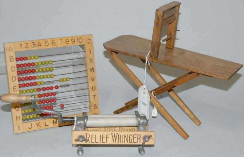 Appraisal: Children's Toys Includes child's Relief wringer advertising horseshoe clothes Wooden