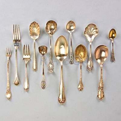 Appraisal: COLLECTION OF SILVER UTENSILS Assorted serving spoons forks ladles salt