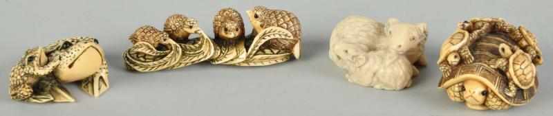 Appraisal: Lot of Ivory Netsukes Description Includes one with two sheep