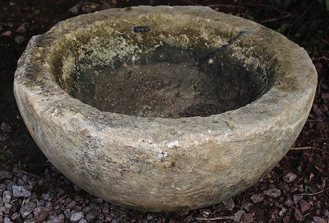 Appraisal: AN OLD COTSWOLD STONE CIRCULAR SINK or bowl approximately cm