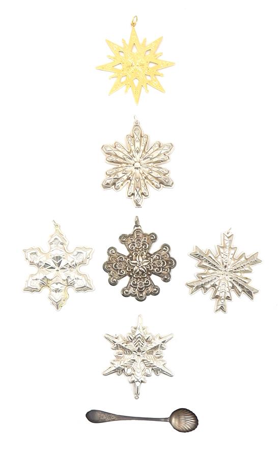 Appraisal: SILVER Six sterling silver snowflakes along with a Gorham Paul