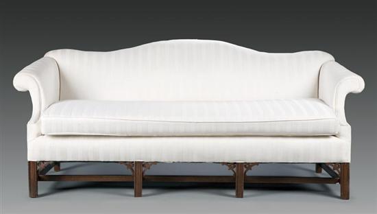 Appraisal: CHIPPENDALE-STYLE SOFA American late th century mahogany Single cushion sofa