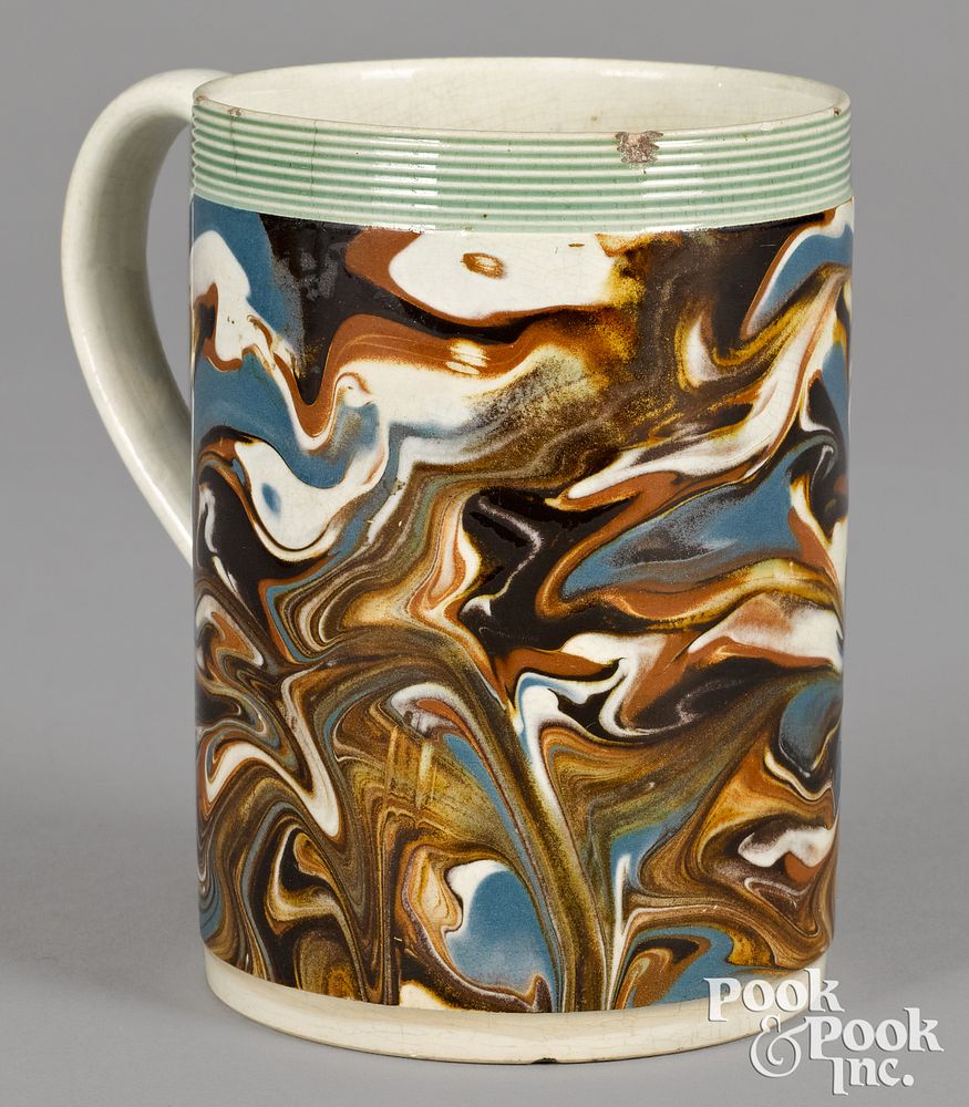 Appraisal: Mocha mug with marbleized glaze Mocha mug with marbleized glaze