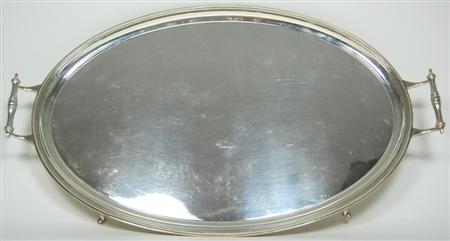 Appraisal: A twin handled butler's tray Birmingham of simple oval outline