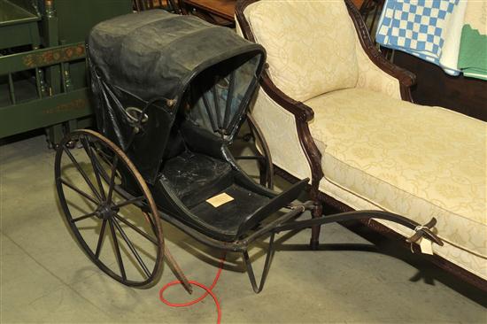 Appraisal: MINIATURE BUGGY American late th century leather wood metals Two