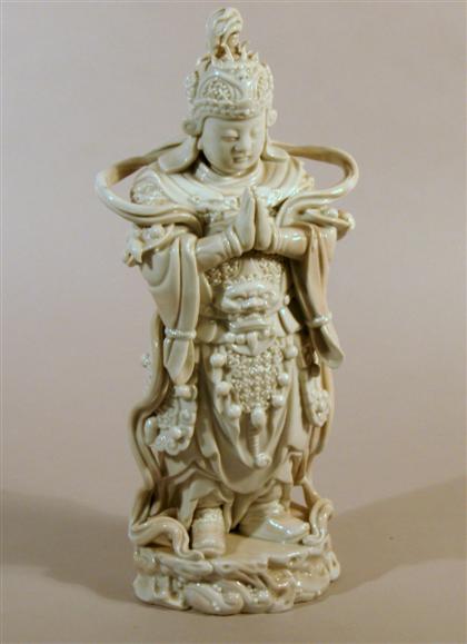 Appraisal: Chinese blanc de chine guardian figure impressed gourd and seal