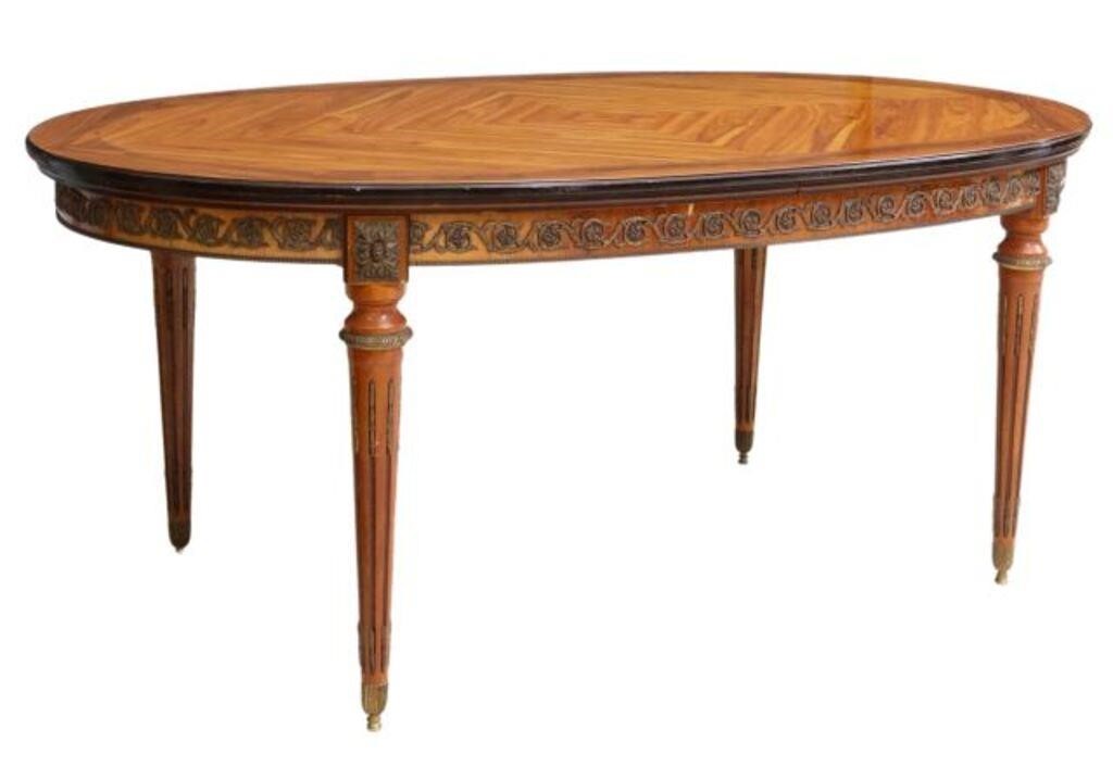 Appraisal: French Louis XVI style matched-veneer extension table Jean-Pierre Ehalt late