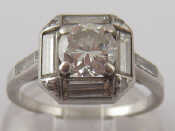 Appraisal: A white metal tests platinum round brilliant and baguette cut