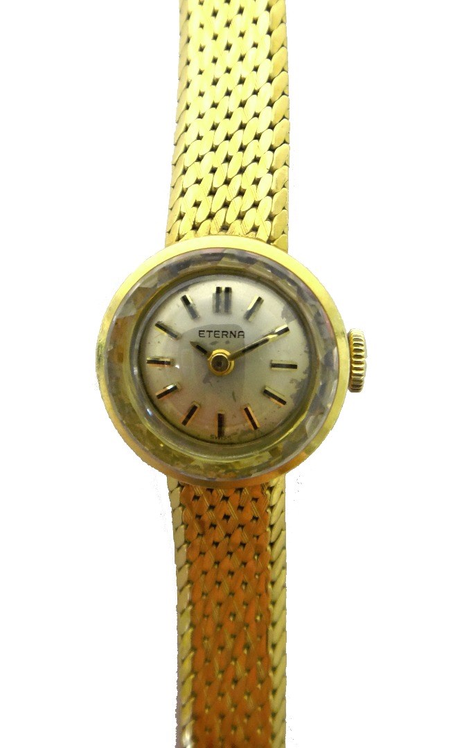 Appraisal: A lady's gold Eterna bracelet wristwatch the signed circular silvered