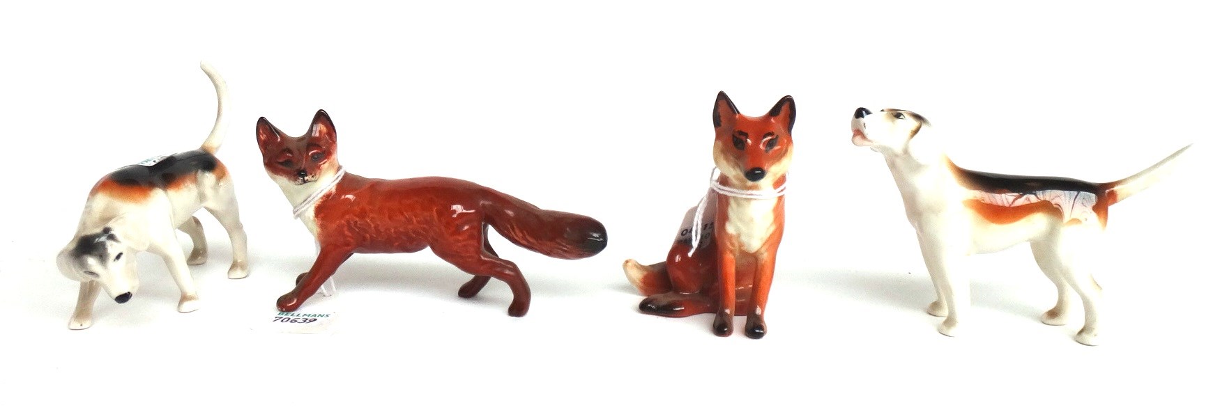 Appraisal: Five Beswick hounds one a f and two Beswick foxes